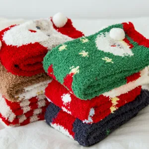 Soft coral fleece Christmas socks featuring Santa Claus patterns for winter warmth
