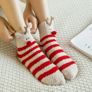 Cozy Christmas reindeer striped coral fleece socks for festive and warm winter loungewear