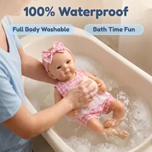 12-inch platinum silicone baby doll in a bubble bath showing full body washable feature