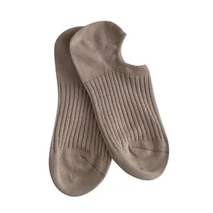 Minimalist pair of brown ribbed cotton no-show socks for women, breathable and comfortable design