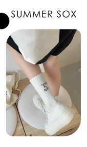 White cotton mid-tube socks feature letter embroidery detail, perfect for spring and summer.