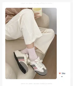 Detailed lifestyle shot showcasing cute ruffled socks with delicate dotted yarn texture.