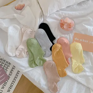 Detailed view of pastel dopamine color ribbed invisible ankle socks in multiple colors