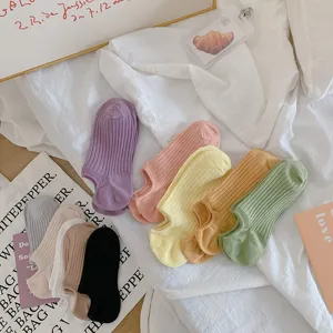 Assorted colorful low-cut rib-knit invisible socks displayed on white aesthetic background
