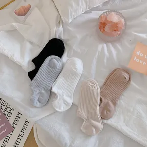 Selection of five pairs of ribbed cotton invisible boat socks in various neutral solid colors