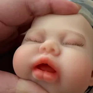 Macro view of a 12-inch full silicone reborn baby doll showing realistic facial details