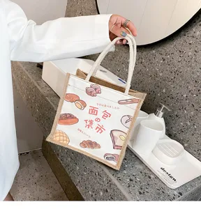 Handgefertigte Leinentasche mit süßen Brot-Illustrationen für Mode und den täglichen Gebrauch