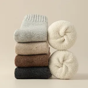 Premium heavyweight men's wool winter socks with warm terry lining in neutral colors