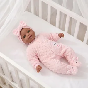 17 inch lifelike African American reborn baby doll in pink rabbit print onesie and crib