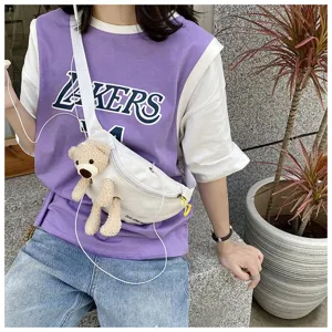 Casual white canvas chest bag for women featuring a cute plush teddy bear decoration