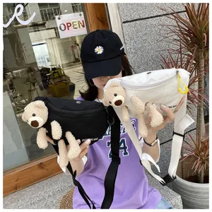 Black and white canvas chest bags featuring plush teddy bear detail for outdoor style