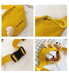 Detail shots of yellow canvas chest bag with plush bear and adjustable strap