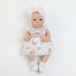 Realistische 18-Zoll Bettie Reborn-Babypuppe mit Spitzenblumenkleid und rosa Stirnband