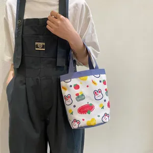 Cute cartoon canvas tote bag with bunny prints, perfect for lunch or daily use