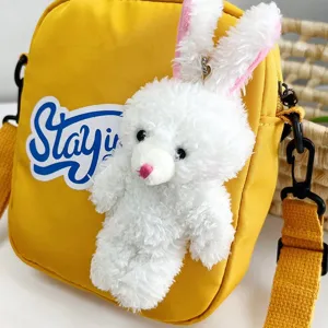 Lindo bolso de hombro amarillo estilo japonés con conejito de peluche blanco y Stayin