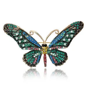 Vintage butterfly brooch with colorful rhinestone crystals and gold-tone finish details