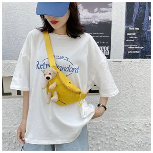 Yellow canvas chest bag with cute teddy bear ornament for stylish women's casual wear