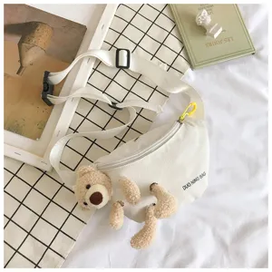 Cute plush teddy bear detail on a high quality white canvas casual waist bag for women