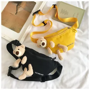 Detailed view showing two colors of trendy canvas chest bags with cute plush teddy bear decor