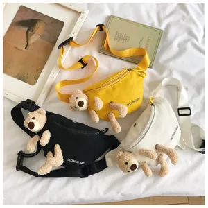 Detailed layout of yellow, black and white canvas waist bags featuring plush teddy bears.