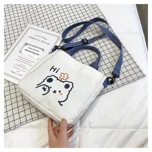 Süße japanische Canvas-Handtasche mit Bären-Cartoon und blauem verstellbarem Gurt