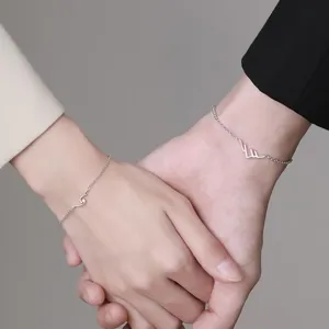 Minimalist silver-toned couple bracelets with mountain and sea pendants for lovers