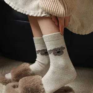 Women cute puppy pattern knitted mid-tube wool socks detail view for autumn winter daily wear.