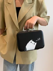 Valisette de maquillage noire avec imprimé chat blanc et poignée en métal argent