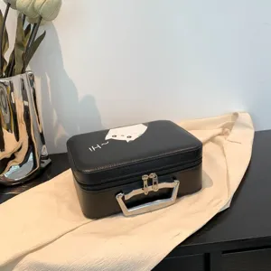 Vue détaillée de la boîte de rangement cosmétique noire avec motif de chat