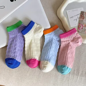 Detail view of breathable hollow candy-color women low cut short socks, cute summer style.