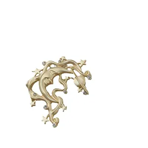Exquisite vintage gold-plated Baroque moon and stars brooch featuring crystal accents