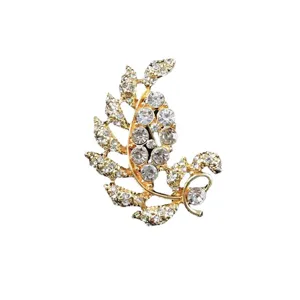 Vintage Baroque gold brooch with clear rhinestones for suit accessories