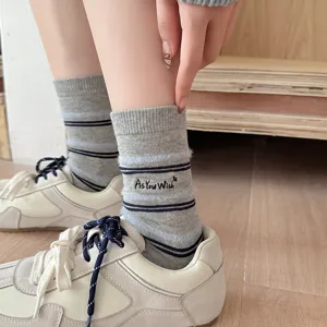 Cozy gray striped mid-calf socks featuring 'As You Wish' embroidery detail for winter