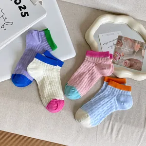 Detailed view of colorful hollow-out short socks, breathable candy-color aesthetic cute boat socks.