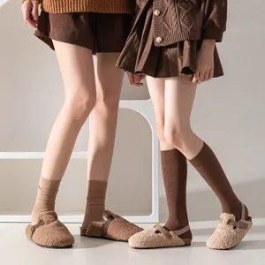 Cozy brown ribbed cotton crew socks for women, anti-pilling warm knit winter hosiery.