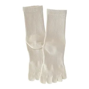Minimalist white five-finger mid-calf socks with high elastic rib and micro-pressure