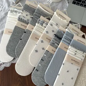 Set of Japanese style floral crew socks with ruffles and slouchy texture in soft tones