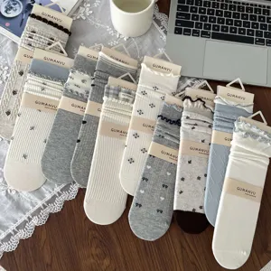 Elegant Japanese style floral mid-calf socks for women with decorative ruffle cuffs