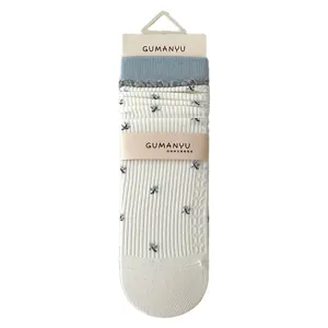 Elegant floral slouch socks for women, cream white mid-calf socks with grey ruffles