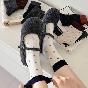 Cozy wool Mary Jane shoes with cute floral mid-calf socks for autumn and winter daily wear.