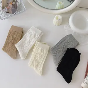 Embossed diamond pattern cotton mid-calf socks for women in solid neutral colors