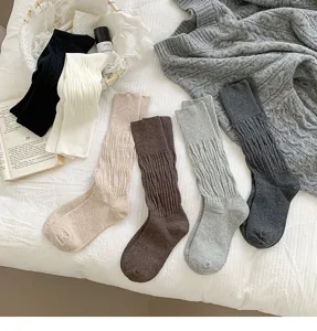 Detailed view of cozy knit slouch socks in multiple colors, perfect for autumn winter.