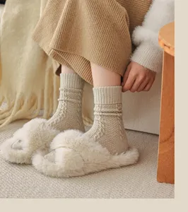 Cozy cable knit wool slouch socks for women, perfect for winter warmth and vintage style daily wear.