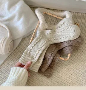 Cozy cable-knit wool socks in neutral tones, featuring textured cozy design for daily winter wear.