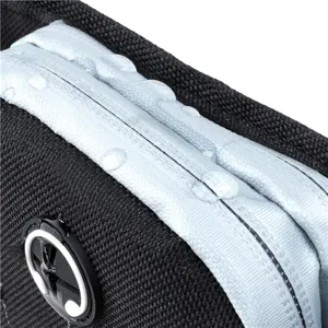 Close-up of waterproof zipper with water droplets on outdoor pet training waist bag