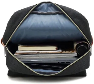 Detailed view of the large interior capacity of a black canvas laptop backpack