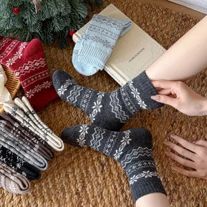 Women winter warm wool mid-tube socks, classic Fair Isle snow pattern cozy knit hosiery.