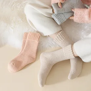 Thick warm winter wool blend crew socks for women, cozy solid color thermal fleece knit socks.