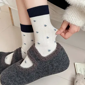 Korean style floral mid-calf women socks with contrast color cuffs, soft and breathable wool blend.
