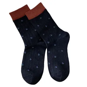Women's mid-calf socks with contrast brown cuffs and delicate floral patterns, autumn winter warm.
